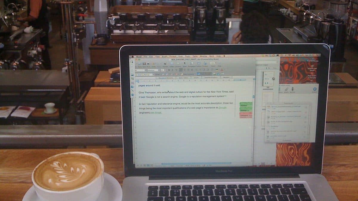 Working on a laptop at a coffee shop